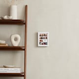"Framed Photo: Nine Photo" - Framed Photo in White by Leia Matt - In a Room