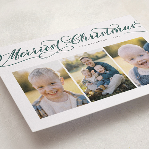 This is a pine letterpress holiday cards with letterpress by Sarah Brown called merriest script printing on bright white letterpress paper in standard