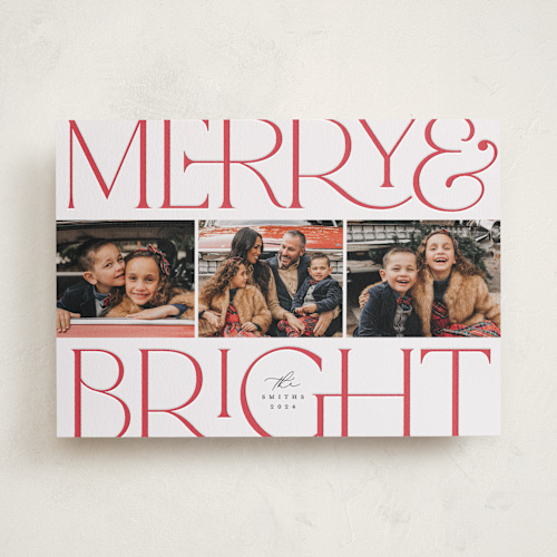 This is a cherry letterpress holiday cards with letterpress by Laura Hamm called merry and bright printing on bright white letterpress paper in standard