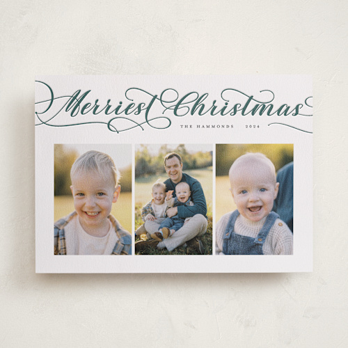 This is a pine letterpress holiday cards with letterpress by Sarah Brown called merriest script printing on bright white letterpress paper in standard