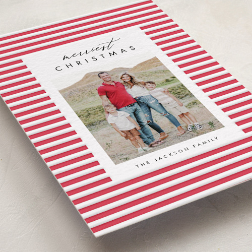 This is a rose letterpress holiday cards with letterpress by Amy Kross called merry stripes printing on bright white letterpress paper in standard