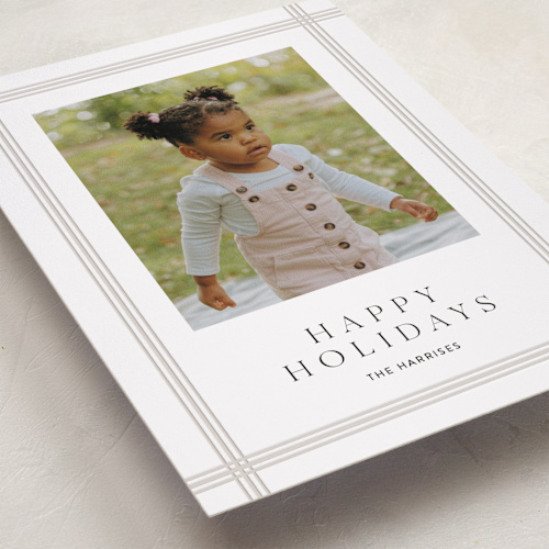 This is a creme letterpress holiday cards with letterpress by Erin L. Wilson called sidelined printing on bright white letterpress paper in standard