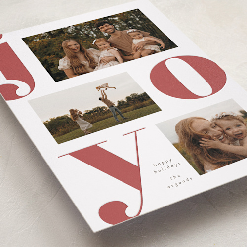 This is a rust letterpress holiday cards with letterpress by Susan Asbill called modern joy printing on bright white letterpress paper in standard