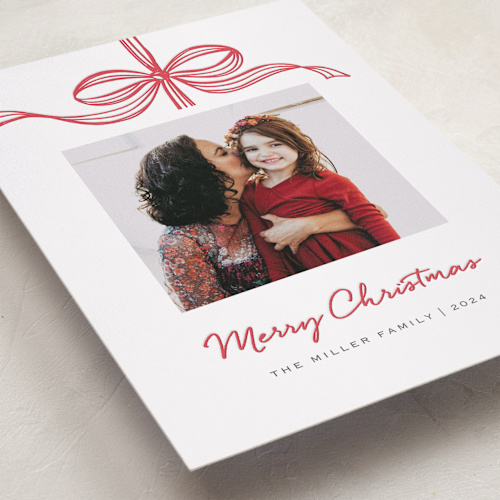 This is a holly berry letterpress holiday cards with letterpress by SimpleTe Design called tied with a bow printing on bright white letterpress paper in standard