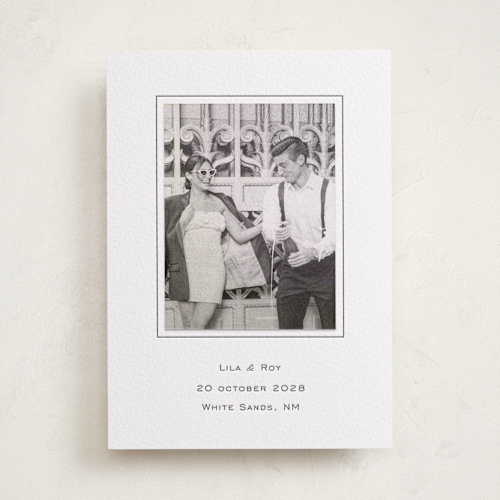 This is a soft black save the date with letterpress by Ani Somi called sophisticate printing on luxe white cotton in photo_mount
