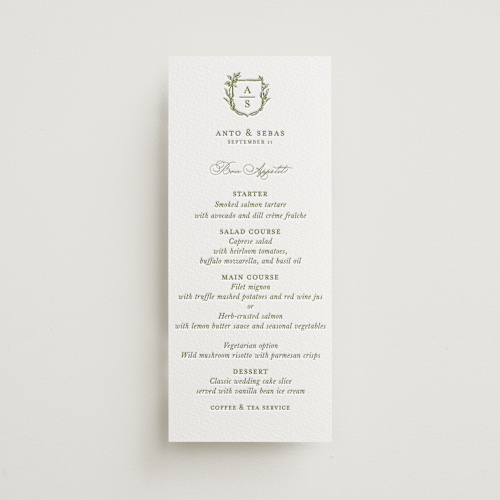 This is a olive menu cards with letterpress by Lucrecia Caporale called botanical crest printing on white cotton in 4x9