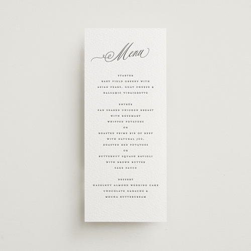 This is a soft black menu cards with letterpress by Susan Zinader called romantic script printing on white cotton in 4x9