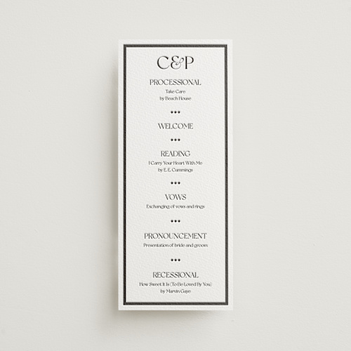 This is a soft black unique wedding programs with letterpress by Julia Liverton called trés chic printing on somerset500 in 4x9