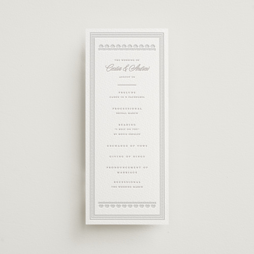 This is a dove grey unique wedding programs with letterpress by Vera Lim called shell border printing on somerset500 in 4x9