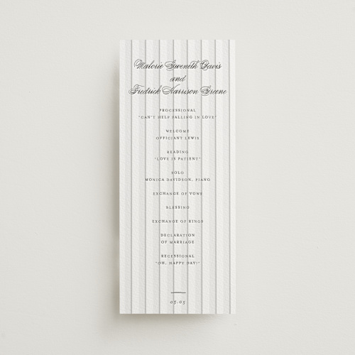 This is a soft black unique wedding programs with letterpress by Baumbirdy called striped printing on white cotton in 4x9