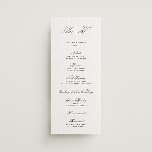 This is a soft black unique wedding programs with letterpress by Kelly Watkins called bliss printing on somerset500 in 4x9