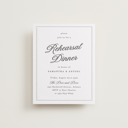 This is a soft black enclosure cards with letterpress by Nicole Walsh called tux printing on white cotton in standard