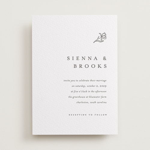 This is a soft black letterpress wedding invitations with letterpress by Pixel and Hank called floral cascade printing on somerset500 in standard