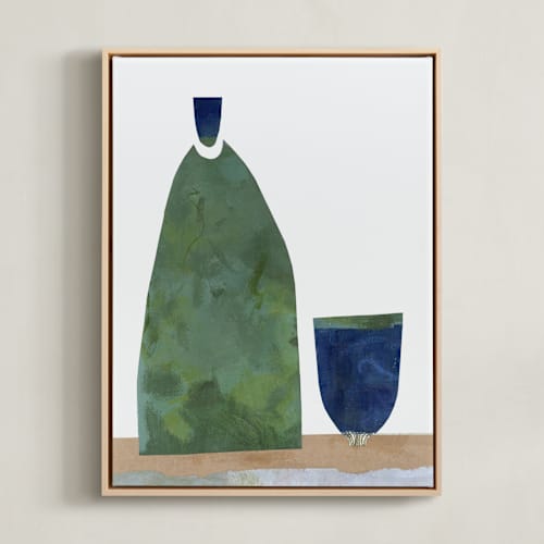 This is a green bottle art with standard by Bethania Lima called over the nightstand table
