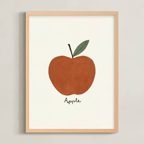 This is a fuji red nursery wall art with standard by Betsy Siber called round fruit duo 1