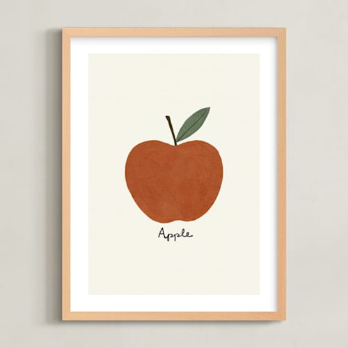 This is a fuji red nursery wall art with standard by Betsy Siber called round fruit duo 1