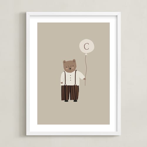 This is a tan nursery wall art with standard by Angela Thompson called balloon bear