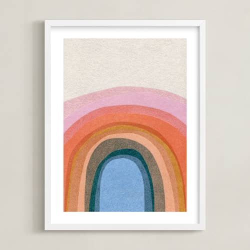 This is a rainbow nursery wall art with standard by Carrie Moradi called rainbow hill