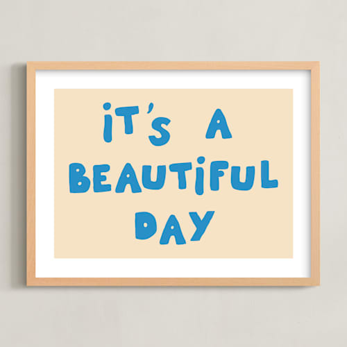 This is a blue nursery wall art with standard by Studio Suku called it's a beautiful day