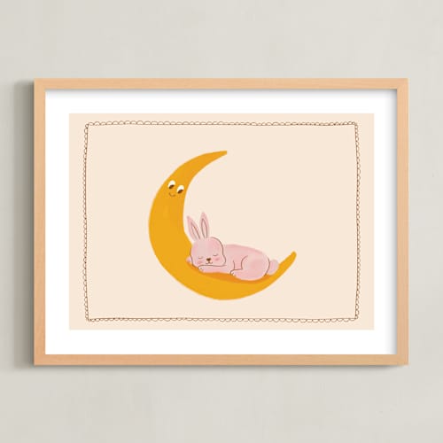 This is a beige nursery wall art with standard by Kartika Paramita called sleeping bunny