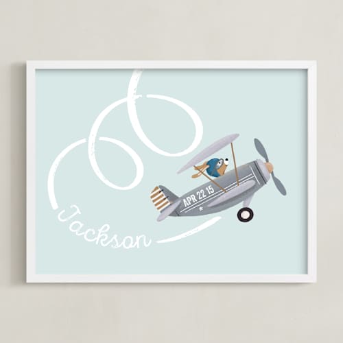 This is a milky blue nursery wall art with standard by Leia Matt called aerobatics