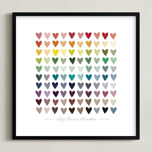 This is a rainbow nursery wall art with standard by InkDot called paper hearts
