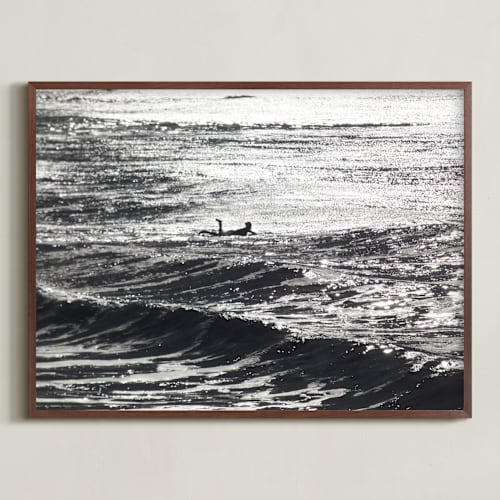 This is a black and white art with standard by Annie Seaton called cayucos pier surfer, winter morning sun