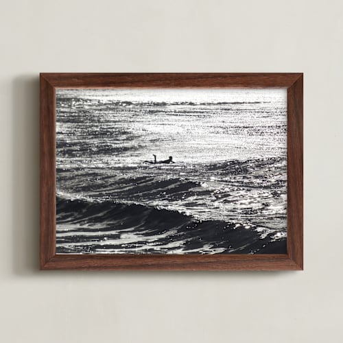This is a black and white art with standard by Annie Seaton called cayucos pier surfer, winter morning sun