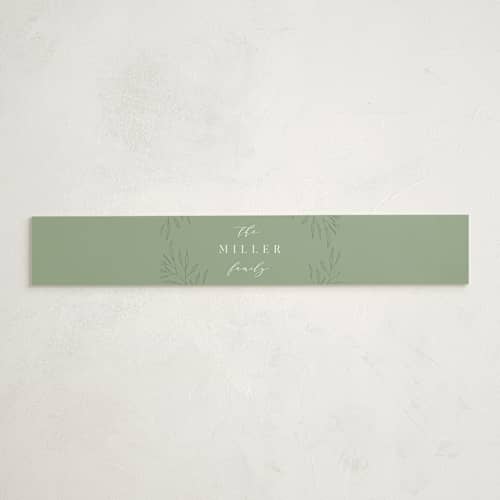 This is a greenery birth announcement belly bands with standard by Kelly Schmidt called minimal botanical monogram printing on signature text in belly band