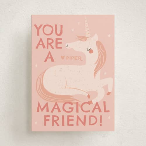 This is a peach kids valentines day cards with standard by Angela Thompson called unicorn magic printing on signature in standard