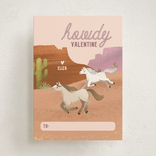 This is a cream kids valentines day cards with standard by Kate Blalock called howdy horses printing on signature in standard