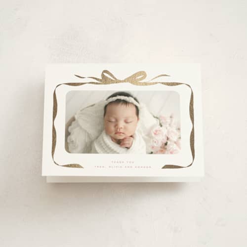 This is a poppy baby thank you cards with foil pressed by Olivia Kanaley Inman called bow printing on strathmore in standard