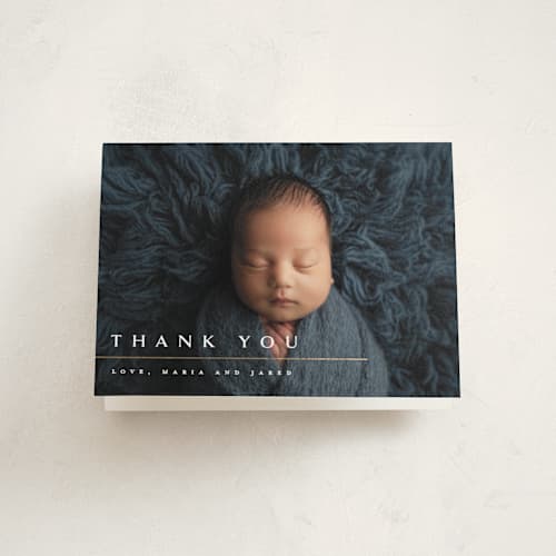 This is a snowfall baby thank you cards with foil pressed by Melanie Kosuge called minimalist printing on strathmore in standard