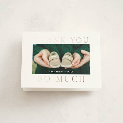 This is a pearl baby thank you cards with foil pressed by Megan Davis called merriest occasion printing on strathmore in standard