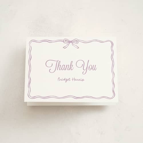 This is a lavander baby thank you cards with standard by Cass Loh called bow frame printing on strathmore in standard