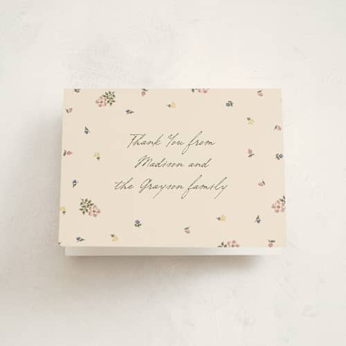 This is a vanilla kids thank you cards with standard by Jenna Holcomb called scattered petals printing on strathmore in standard