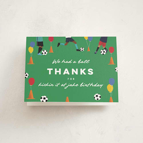 This is a grass kids thank you cards with standard by Becky Nimoy called kick it soccer ball printing on strathmore in standard