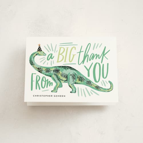 This is a fern kids thank you cards with standard by Alethea and Ruth called dino party hat printing on strathmore in standard