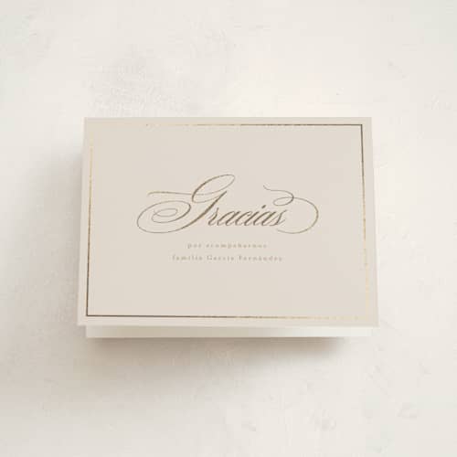 This is a cream graduation thank you cards with foil pressed by Tamara Hilje called gilded printing on strathmore in standard