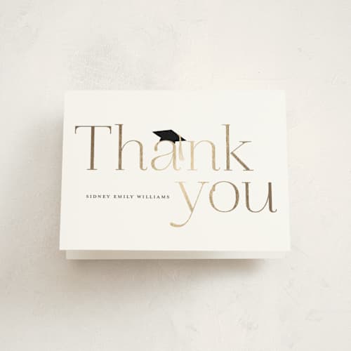 This is a cotton graduation thank you cards with foil pressed by Stacey Meacham called cap and year printing on strathmore in standard