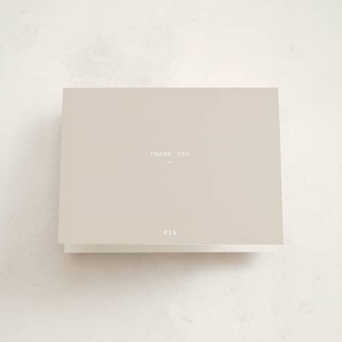 This is a cream graduation thank you cards with standard by JoAnn Jinks called titled printing on strathmore in standard
