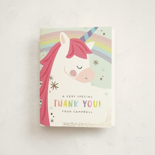 This is a bubblegum thank you cards with foil pressed by peetie design called unicorno printing on strathmore in standard