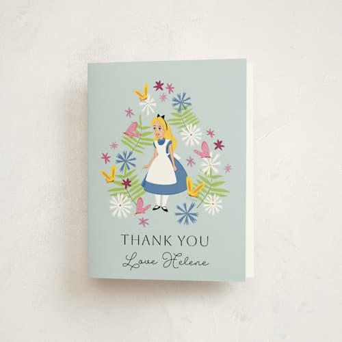 This is a aqua kids thank you cards with standard by Becky Nimoy called disney's alice in wonderland in the flower garden printing on strathmore in standard
