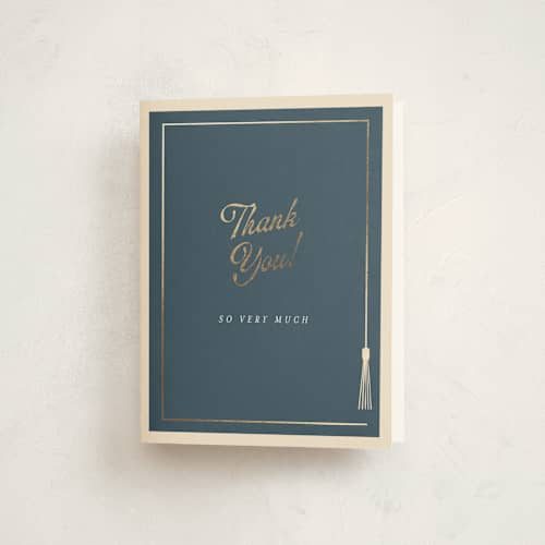 This is a navy graduation thank you cards with foil pressed by AK Graphics called tasseled printing on strathmore in standard