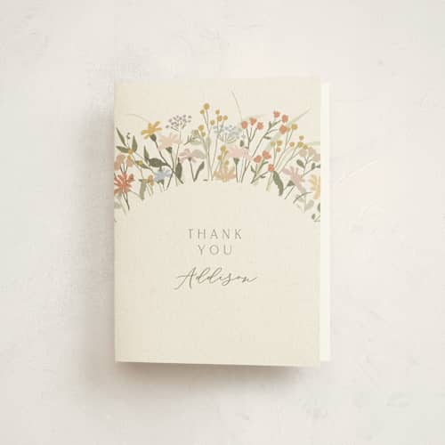 This is a vanilla baby shower thank you cards with standard by Jennifer Wick called meadow flowers printing on strathmore in standard