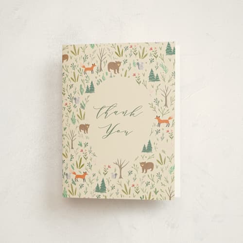 This is a sand baby shower thank you cards with standard by Hannah Williams called oval forest printing on strathmore in standard
