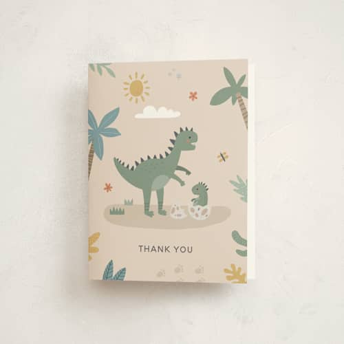 This is a tan baby shower thank you cards with standard by Britt called baby dino printing on strathmore in standard