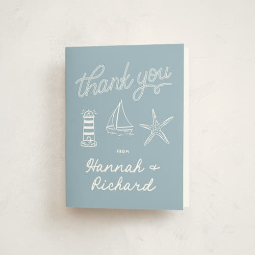 This is a powder blue baby shower thank you cards with standard by Claudia Orengo called nautical celebration printing on strathmore in standard