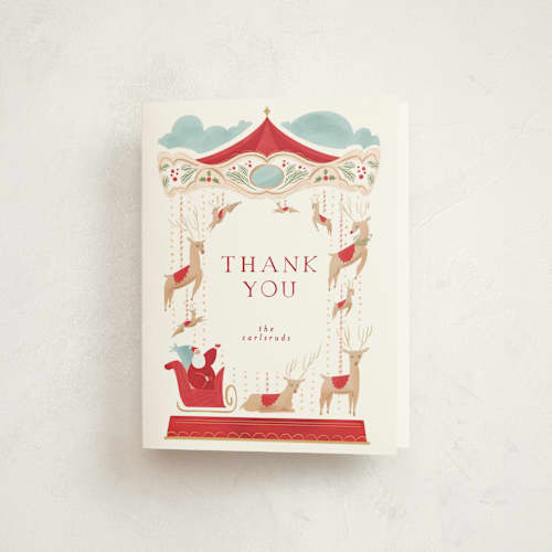 This is a holly red thank you cards with standard by Grae called santa carousel printing on strathmore in standard