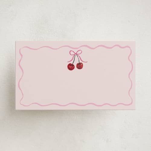This is a blush blank hosting stationery with standard by Cass Loh called vintage wedding cake printing on signature in placecard
